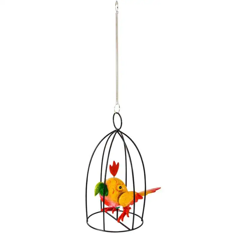 Oiseau jaune en cage à suspendre